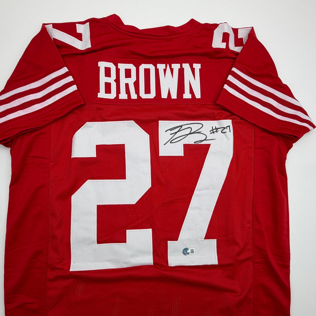 Autographed/Signed Ji'Ayir Brown San Francisco Red Jersey Beckett BAS COA