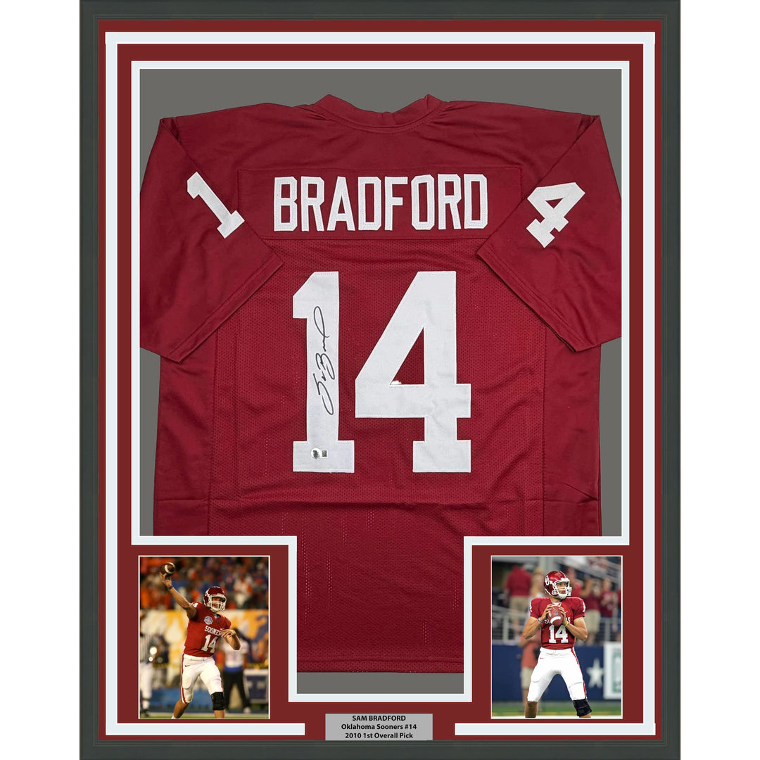 Framed Autographed/Signed Sam Bradford 35x39 Oklahoma Red Jersey Beckett BAS COA