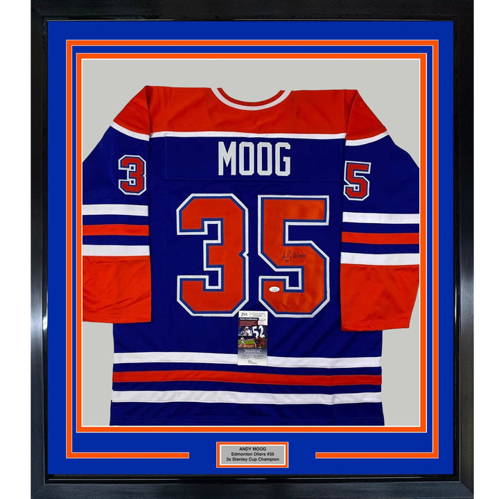 Framed Autographed/Signed Andy Moog 35x39 Edmonton Blue Jersey JSA COA