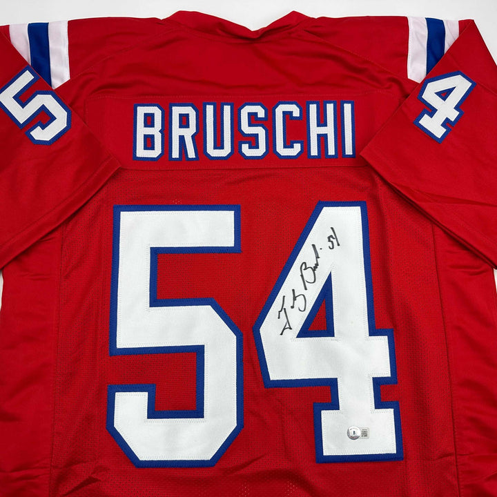 Autographed/Signed Tedy Bruschi New England Red Football Jersey JSA COA