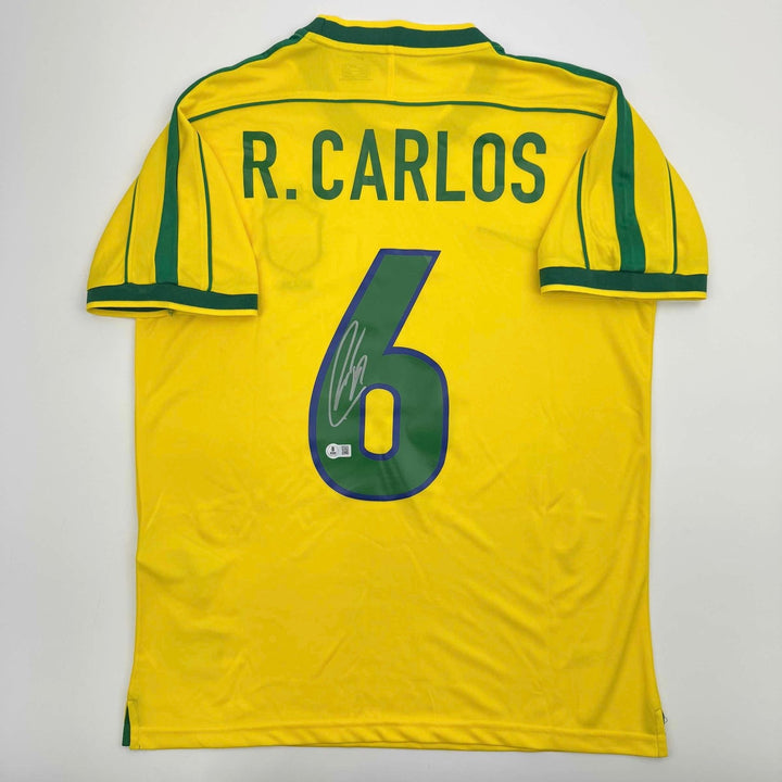 Autographed/Signed Roberto Carlos Brazil Yellow Jersey Beckett BAS COA