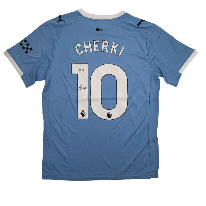Autographed/Signed Rayan Cherki Manchester City Blue Jersey Beckett BAS COA