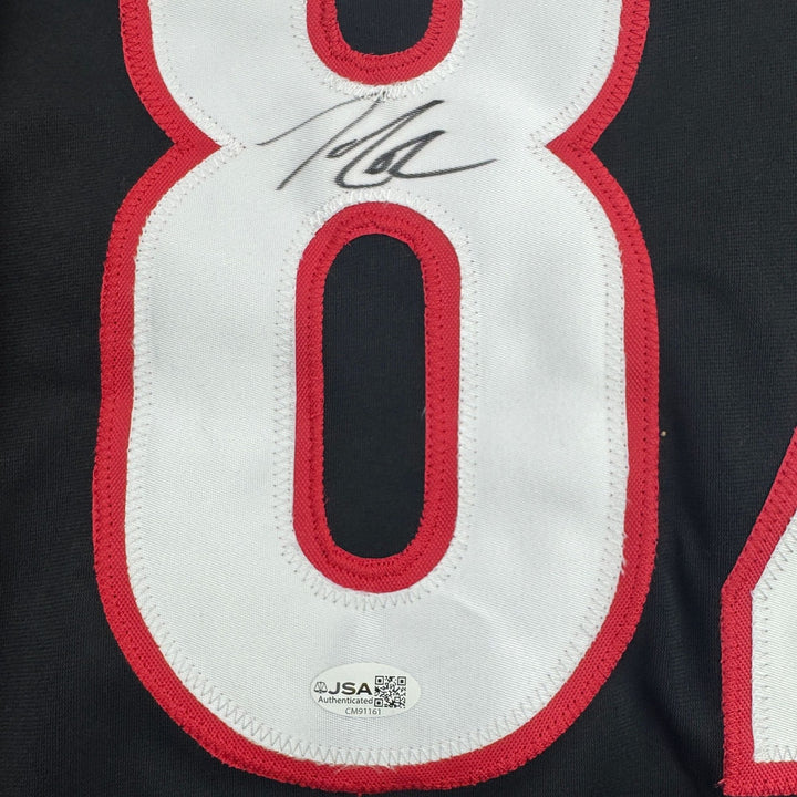 Autographed/Signed Jesperi Kotkaniemi Carolina Black Jersey Beckett BAS COA