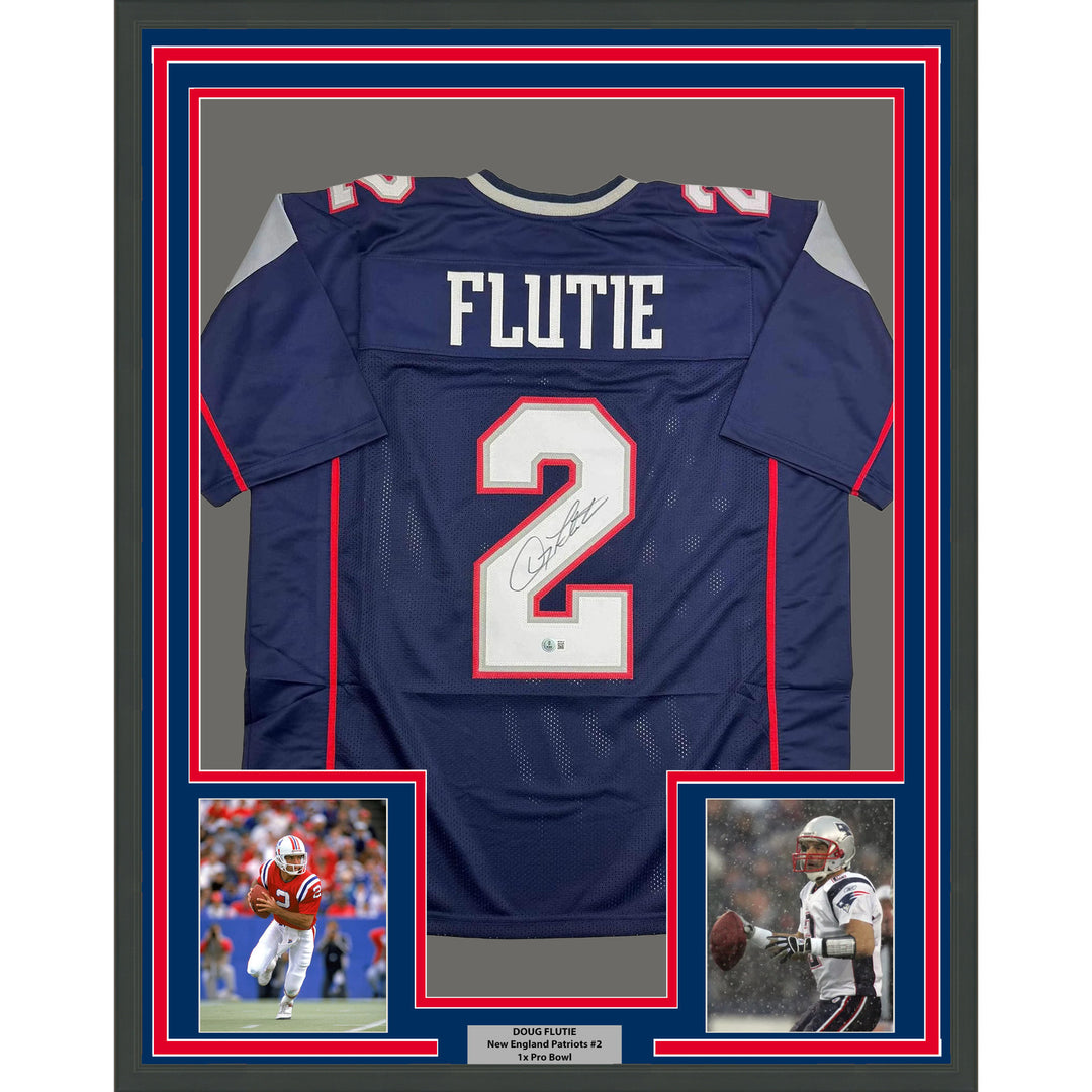 Framed Autographed/Signed Doug Flutie 35x39 New England Blue Jersey Beckett COA