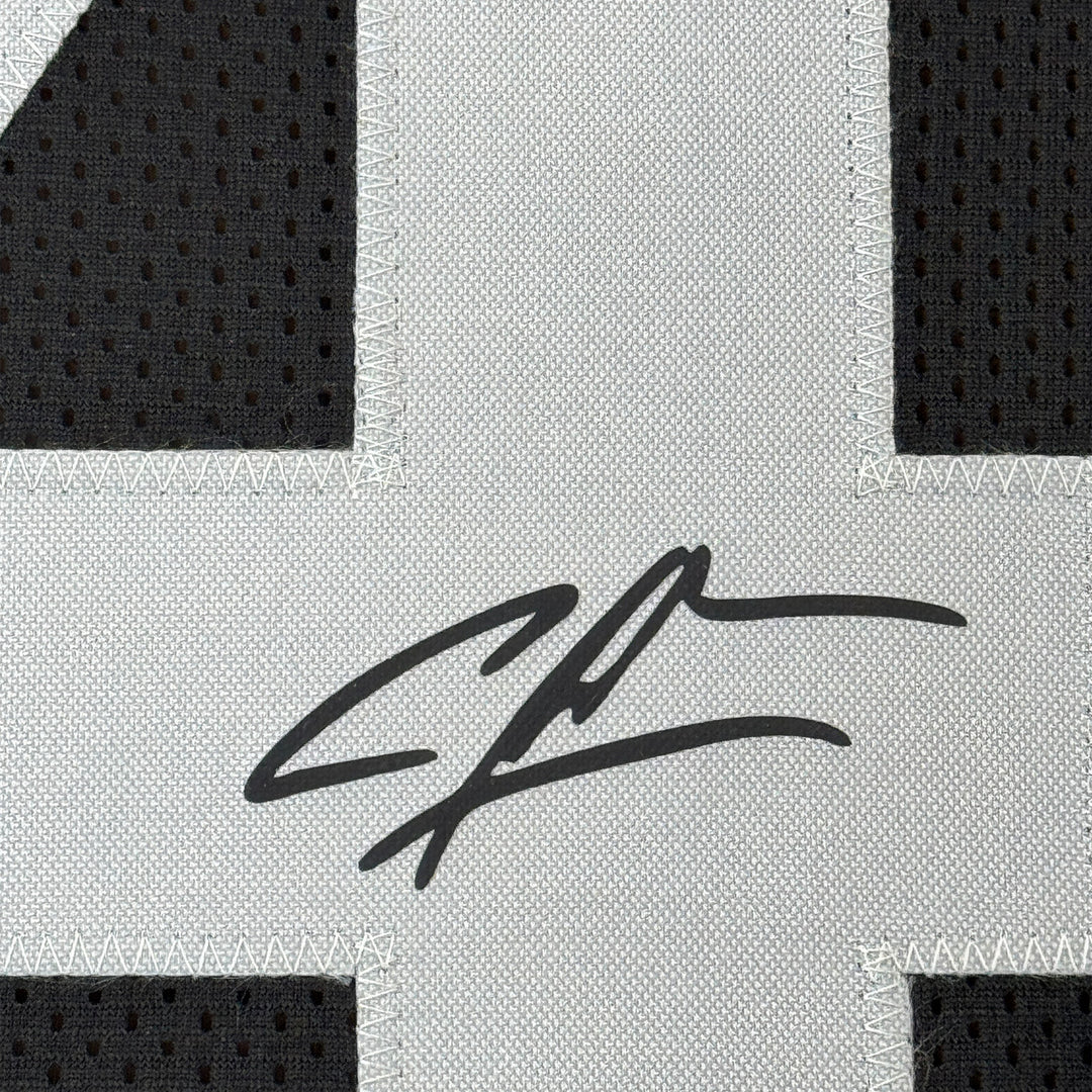 Framed Facsimile Autographed Charles Woodson 33x42 Black Reprint Laser Jersey