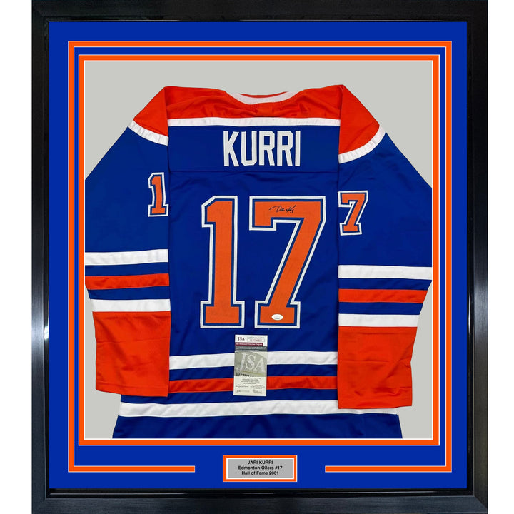 Framed Autographed/Signed Jari Kurri 35x39 Edmonton Blue Hockey Jersey JSA COA