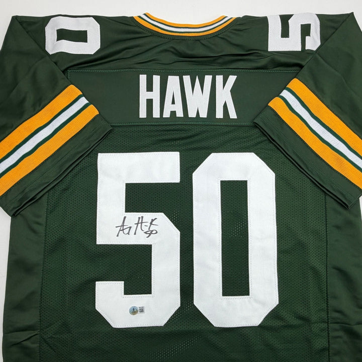 Autographed/Signed AJ Hawk Green Bay Green Football Jersey Beckett BAS COA