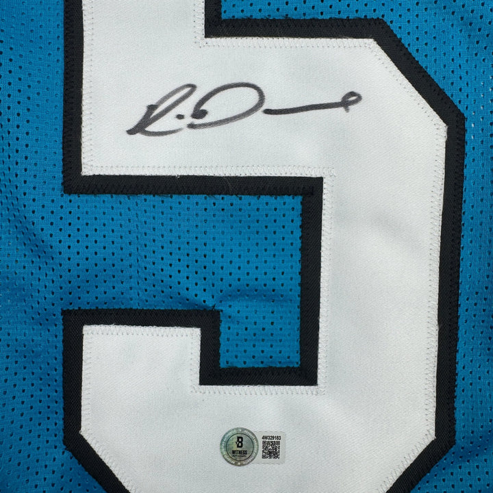 Autographed/Signed Rico Dowdle Carolina Blue Football Jersey Beckett BAS COA