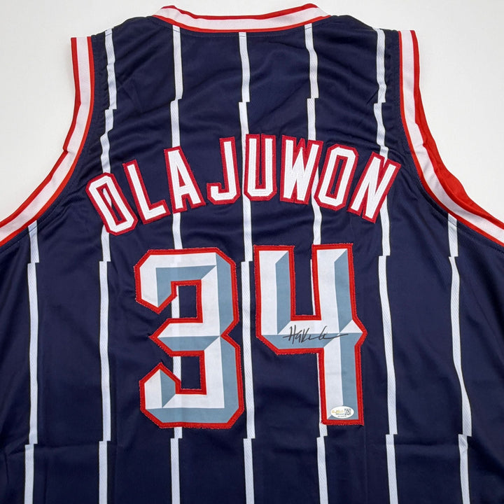 Autographed/Signed Hakeem Olajuwon Houston Blue Basketball Jersey JSA COA