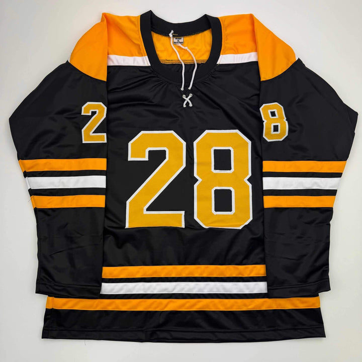 Autographed/Signed Elias Lindholm Boston Black Hockey Jersey JSA COA