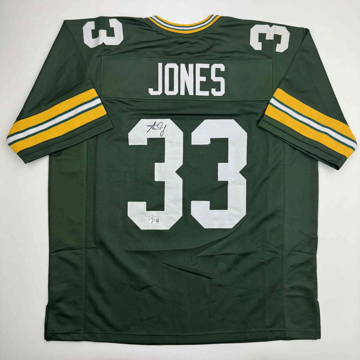 Autographed/Signed Aaron Jones Green Bay Green Football Jersey Beckett BAS COA