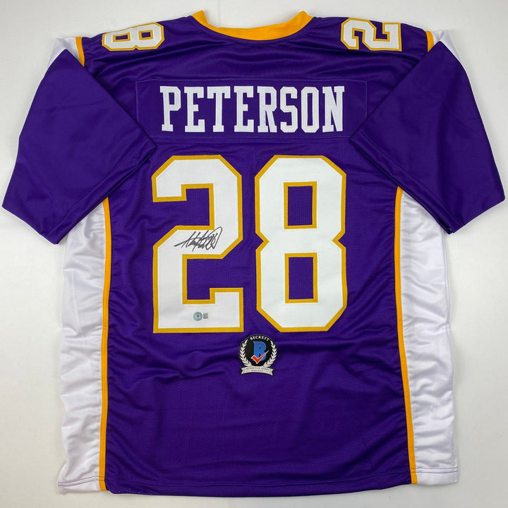 Autographed/Signed Adrian Peterson Minnesota Purple Jersey Beckett COA