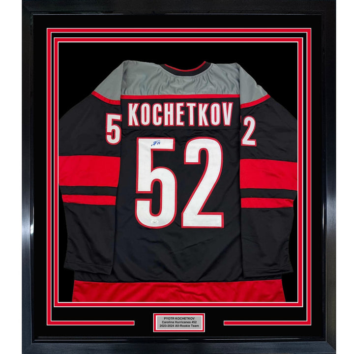 Framed Signed Pyotr Kochetkov 35x39 Carolina Black Jersey JSA COA