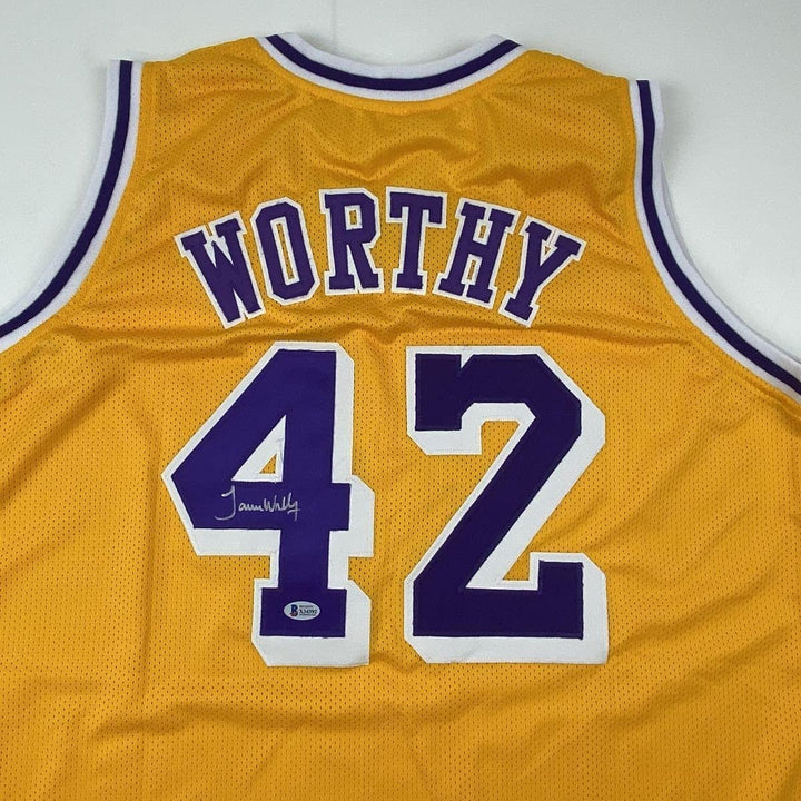 Autographed/Signed James Worthy Los Angeles LA Yellow Jersey Beckett COA