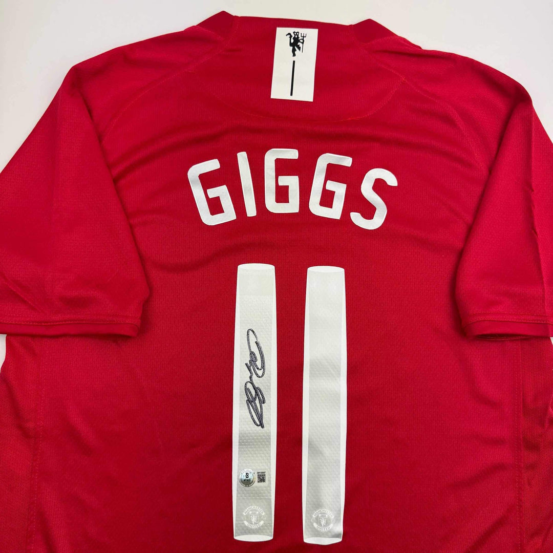 Autographed/Signed Ryan Giggs Manchester United Red Jersey Beckett BAS COA