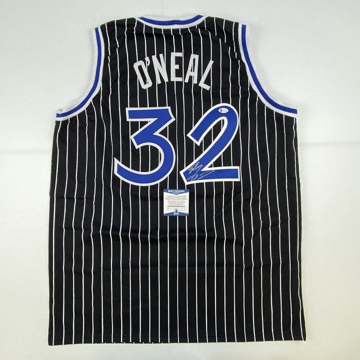 Autographed/Signed SHAQUILLE SHAQ O'NEAL Orlando Black Pinstripe Jersey BAS COA