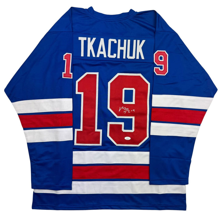 Autographed/Signed Matthew Tkachuk USA 2026 Olympics Blue Hockey Jersey JSA COA