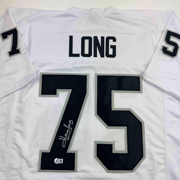 Autographed/Signed Howie Long Oakland White Football Jersey Beckett BAS COA
