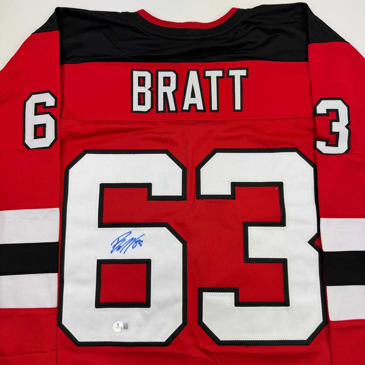 Autographed/Signed Jesper Bratt New Jersey Red Jersey Beckett BAS COA