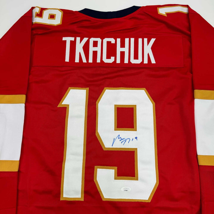 Autographed/Signed Matthew Tkachuk Florida Red Hockey Jersey JSA COA