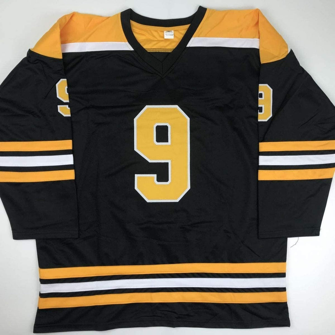 Autographed/Signed Johnny John Bucyk HOF 1981 Boston Black Jersey JSA COA
