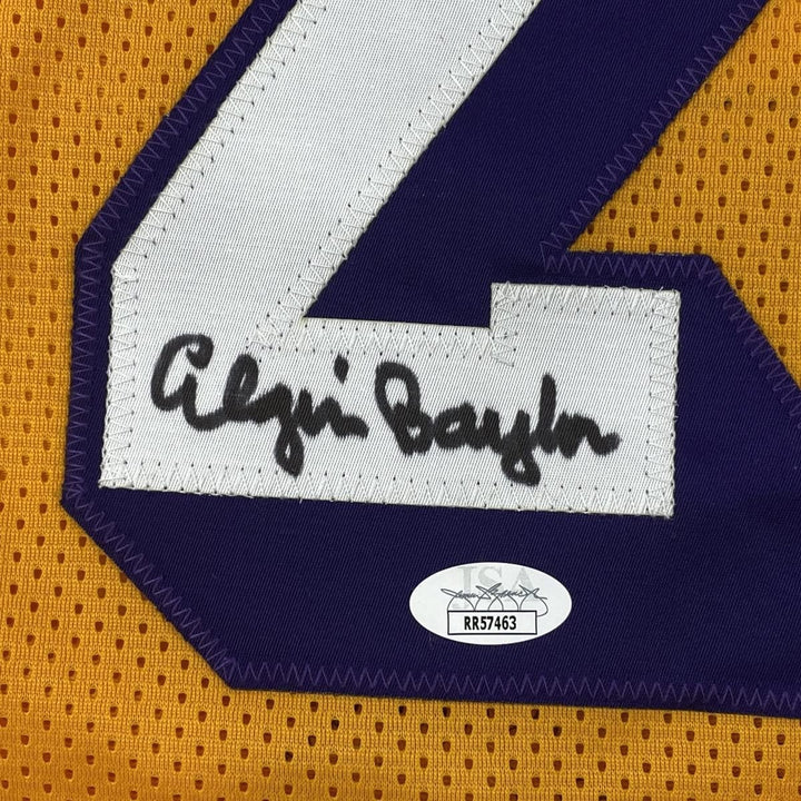 Autographed/Signed ELGIN BAYLOR Los Angeles Yellow Jersey JSA COA
