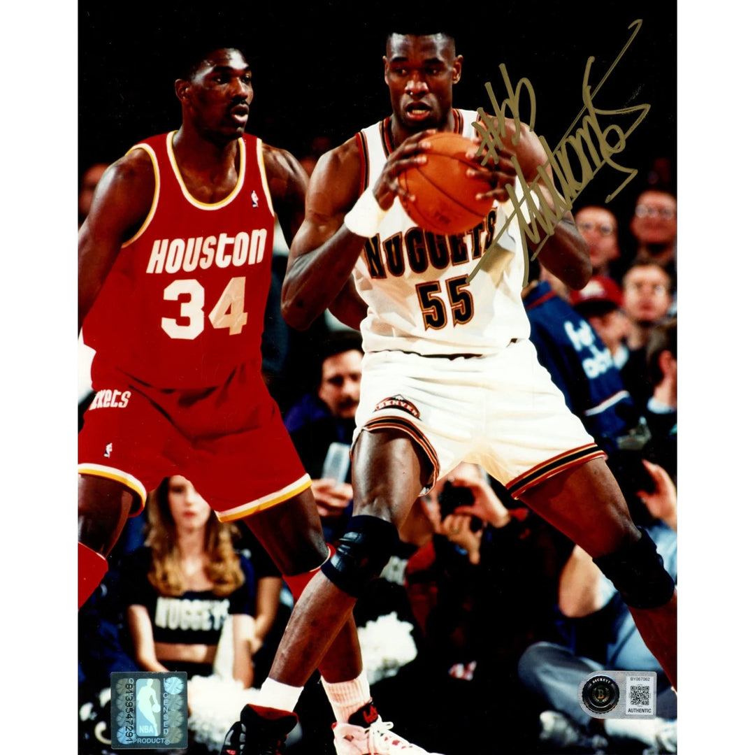 Dikembe Mutombo Autographed/Signed Denver Nuggets 8x10 Photo Beckett 57801