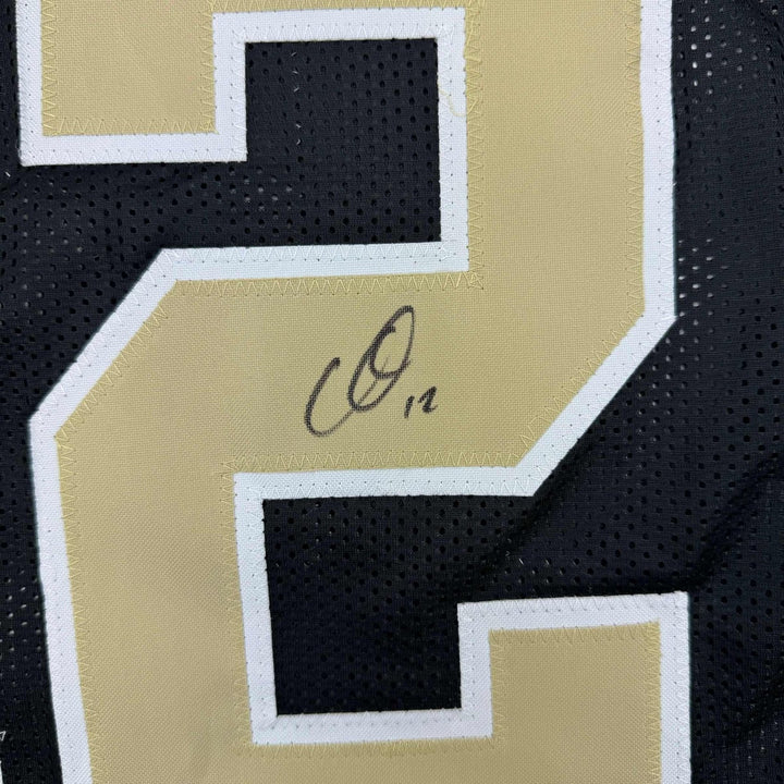 Framed Signed Chris Olave 35x39 New Orleans Black Jersey Beckett COA
