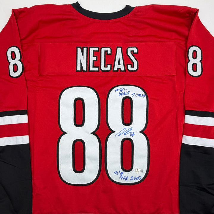 Autographed/Signed Martin Necas Carolina Red Hockey Jersey Beckett BAS COA