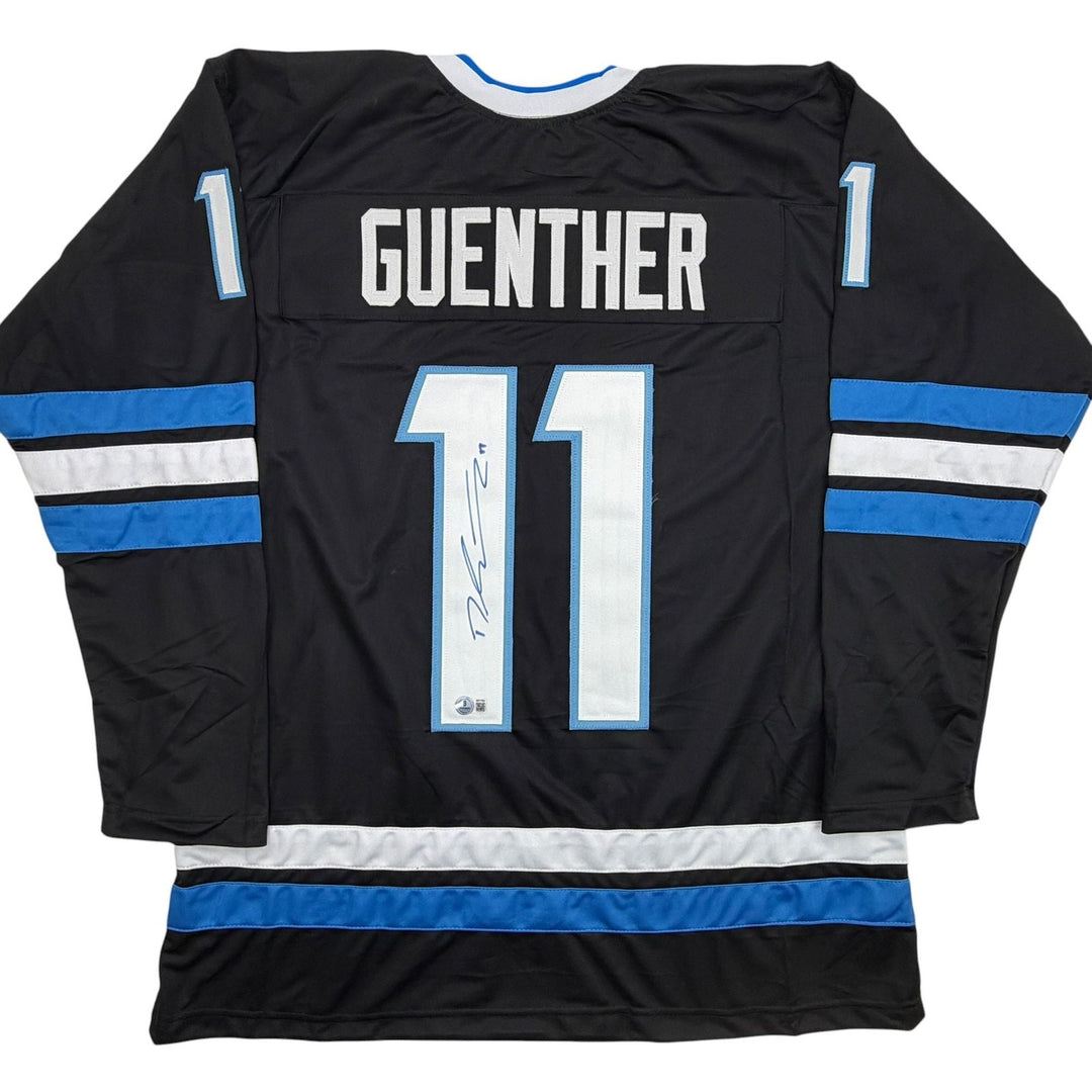 Autographed/Signed Dylan Guenther Utah Black Hockey Jersey Beckett BAS COA
