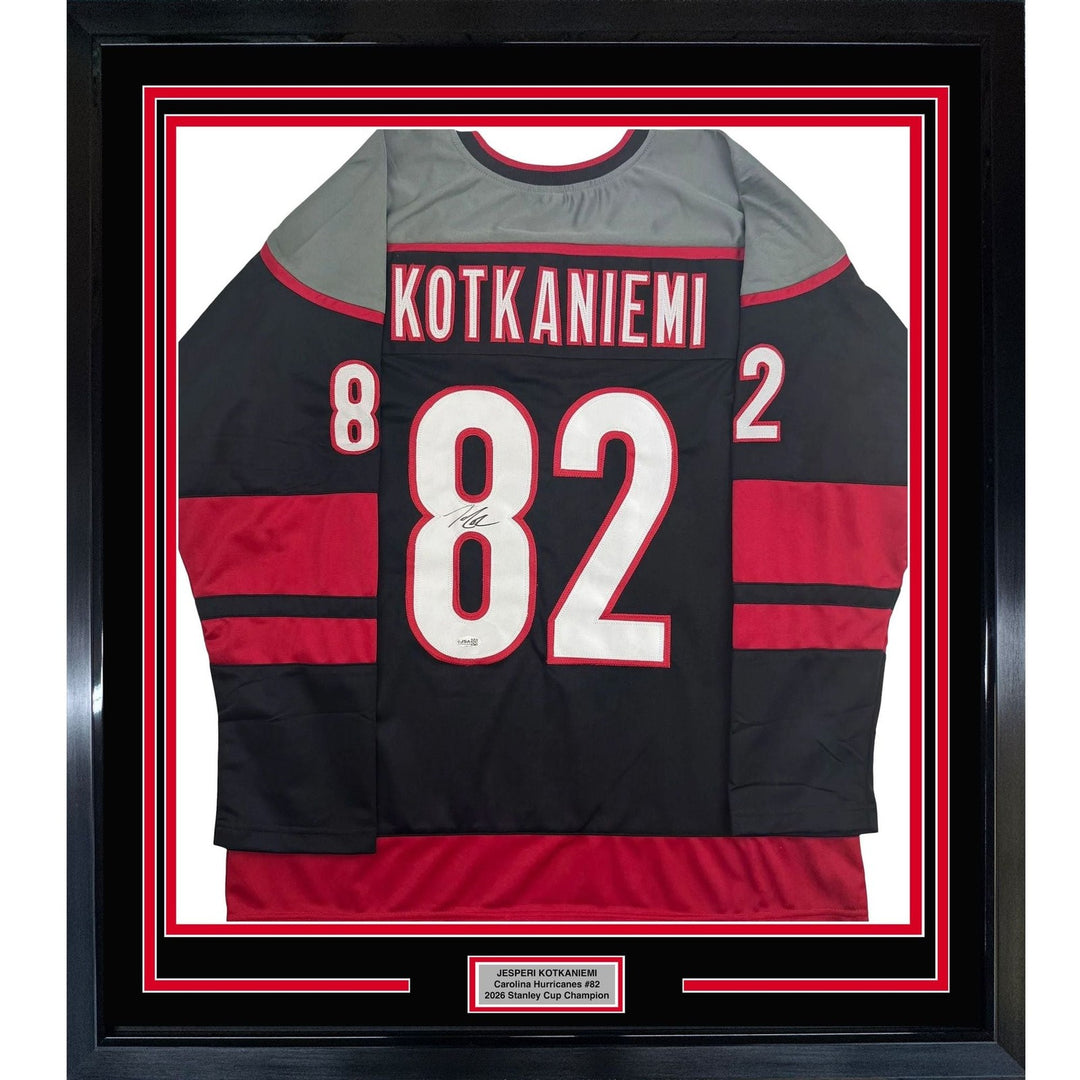 Framed Signed Jesperi Kotkaniemi 35x39 Carolina Black Jersey Beckett COA