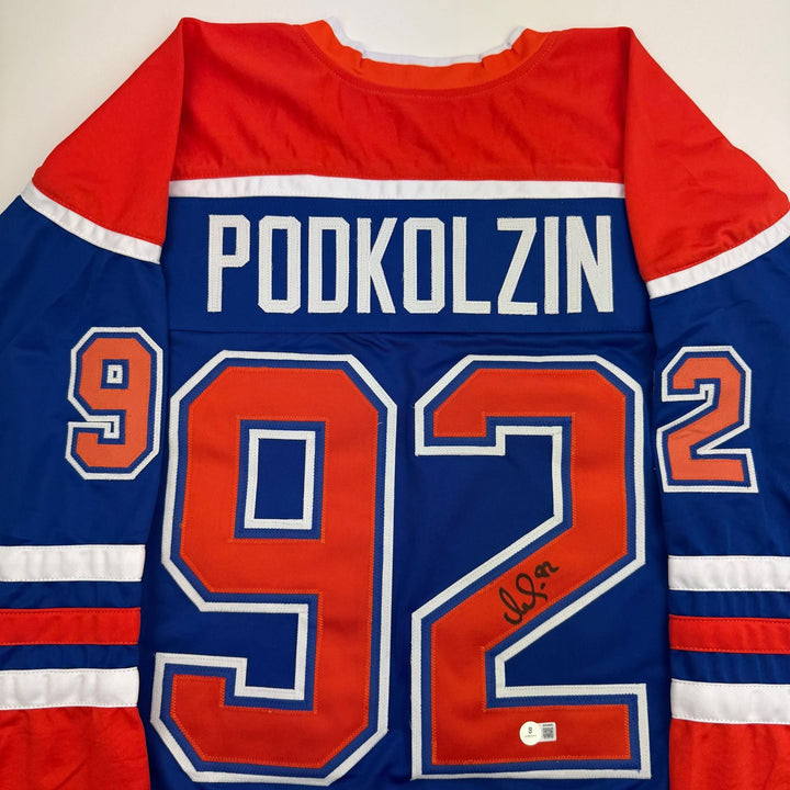 Autographed/Signed Vasily Podkolzin Edmonton Blue Jersey Beckett BAS COA