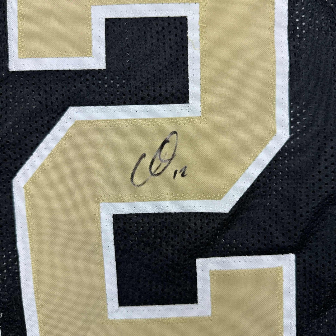 Autographed/Signed Chris Olave New Orleans Black Jersey Beckett BAS COA