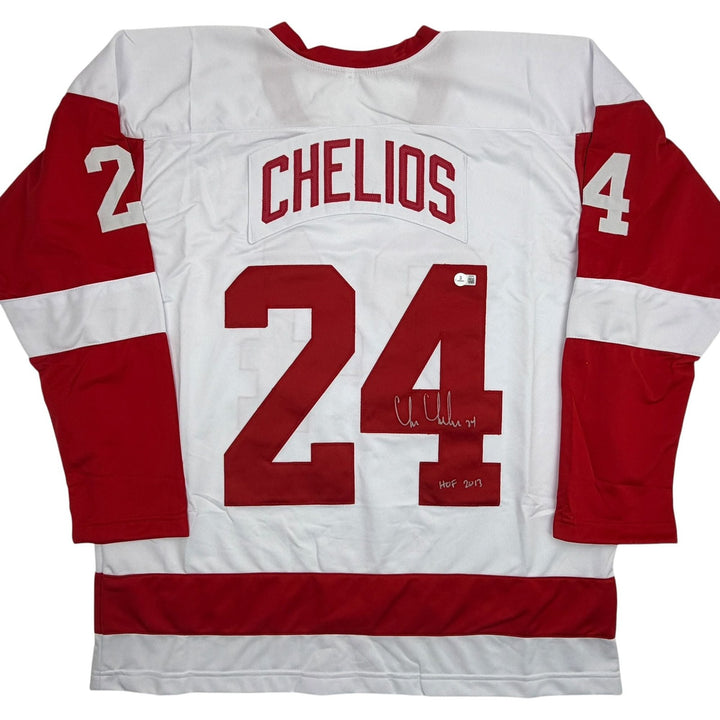 Autographed/Signed Chris Chelios Detroit White Hockey Jersey Beckett COA