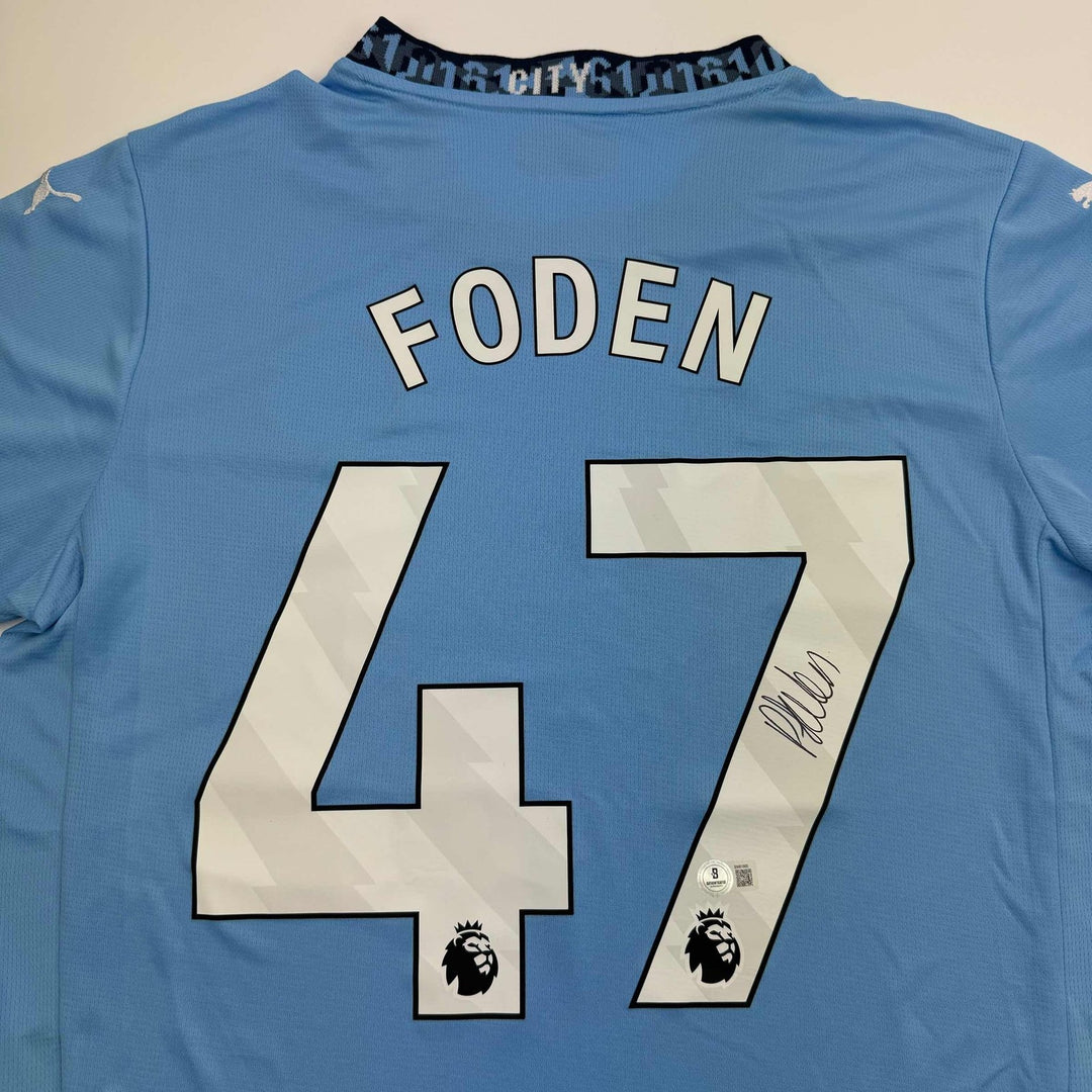 Autographed/Signed Phil Foden Manchester City Blue Futbol Jersey BAS COA