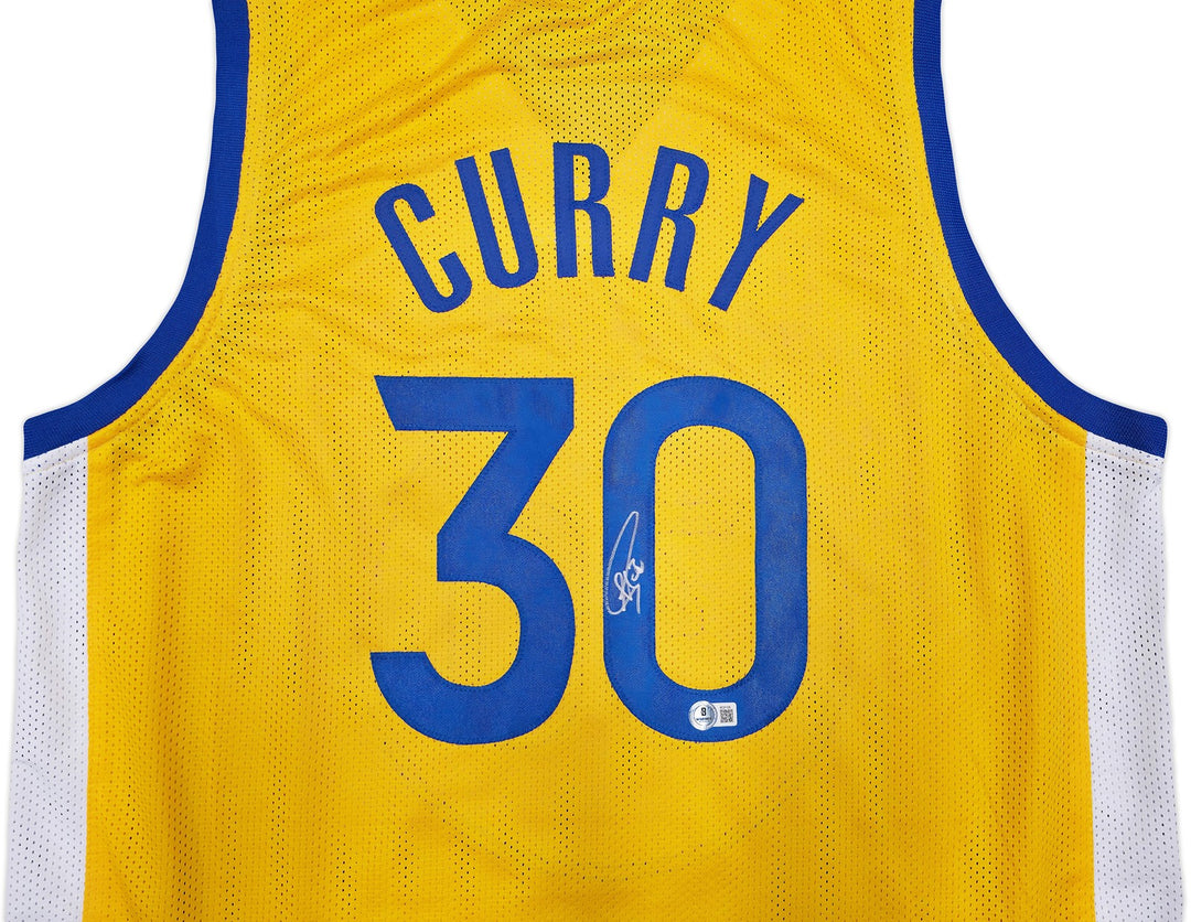 Golden State Warriors Stephen Curry Signed Yellow Jersey Beckett