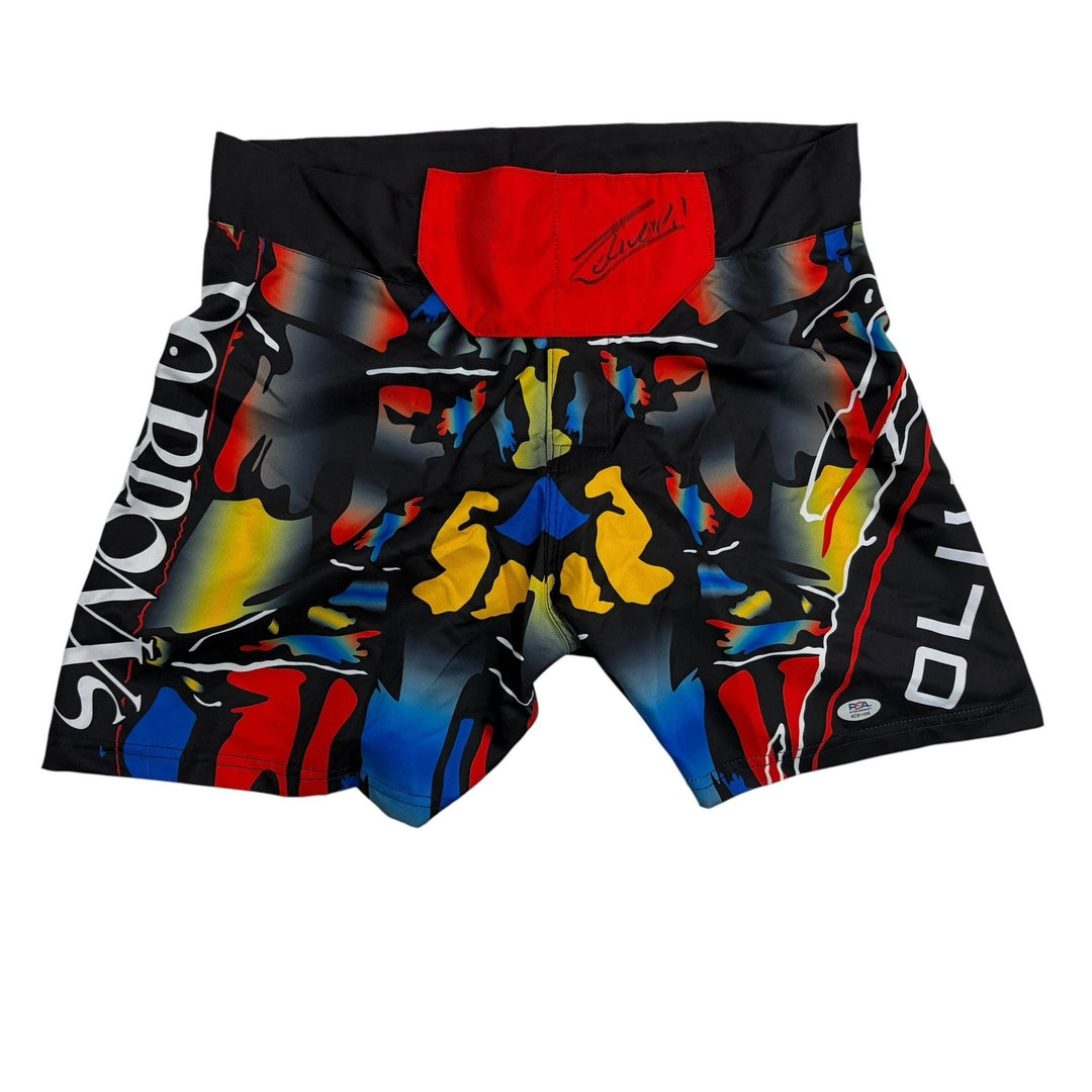Autographed/Signed Charles Oliveira UFC MMA Trunks Shorts PSA/DNA COA