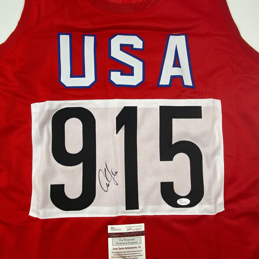 Autographed/Signed Carl Lewis Track United States USA Olympics Jersey JSA COA