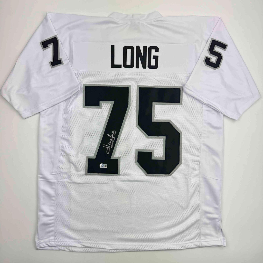 Autographed/Signed Howie Long Oakland White Football Jersey Beckett BAS COA