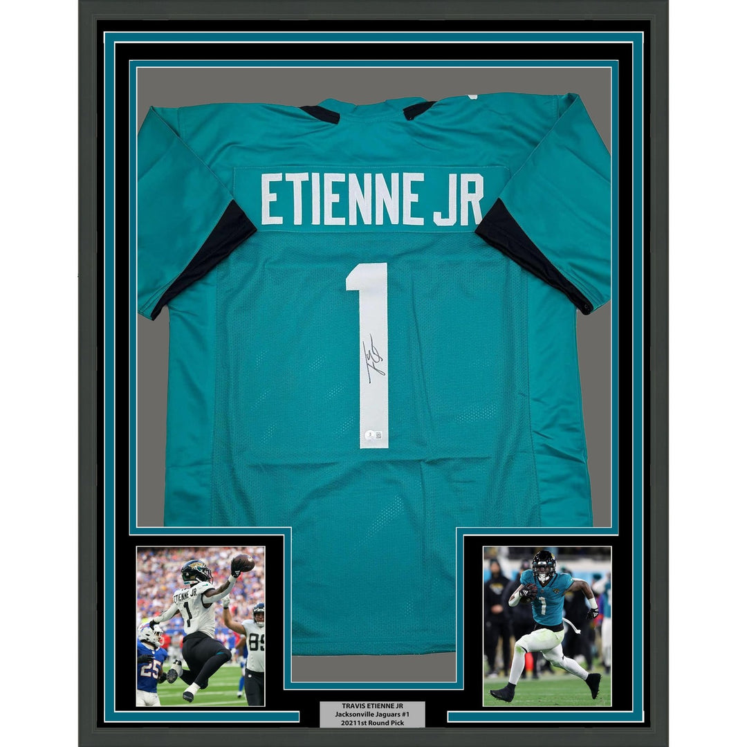 Framed Autographed/Signed Travis Etienne Jr. 35x39 Teal Jersey Beckett COA