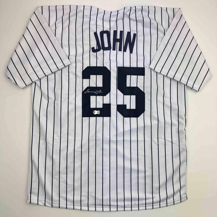 Autographed/Signed Tommy John New York Pinstripe Baseball Jersey Beckett BAS COA