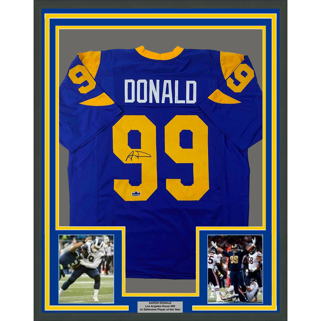 Framed Facsimile Autographed Aaron Donald 33x42 Blue Retro Reprint Laser Jersey