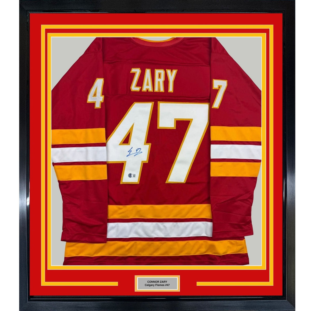 Framed Autographed/Signed Connor Zary 35x39 Calgary Red Jersey Beckett COA