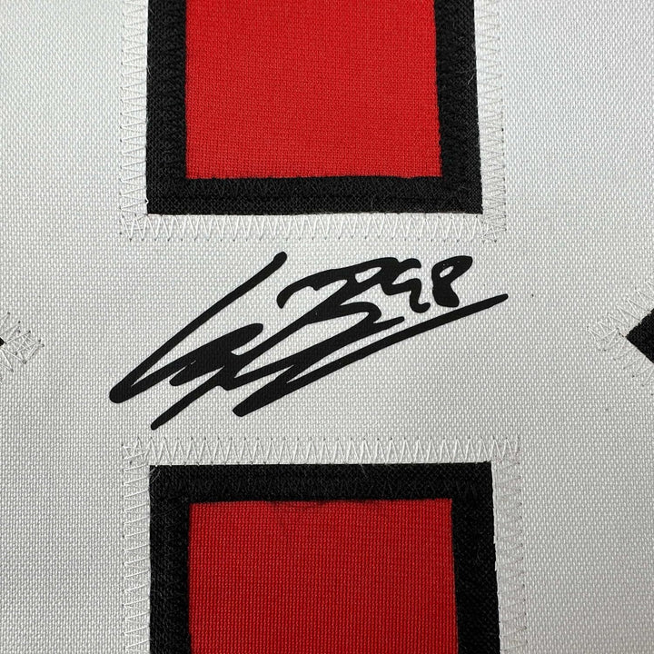 Framed Facsimile Autographed Connor Bedard 33x42 Red Reprint Laser Auto Jersey