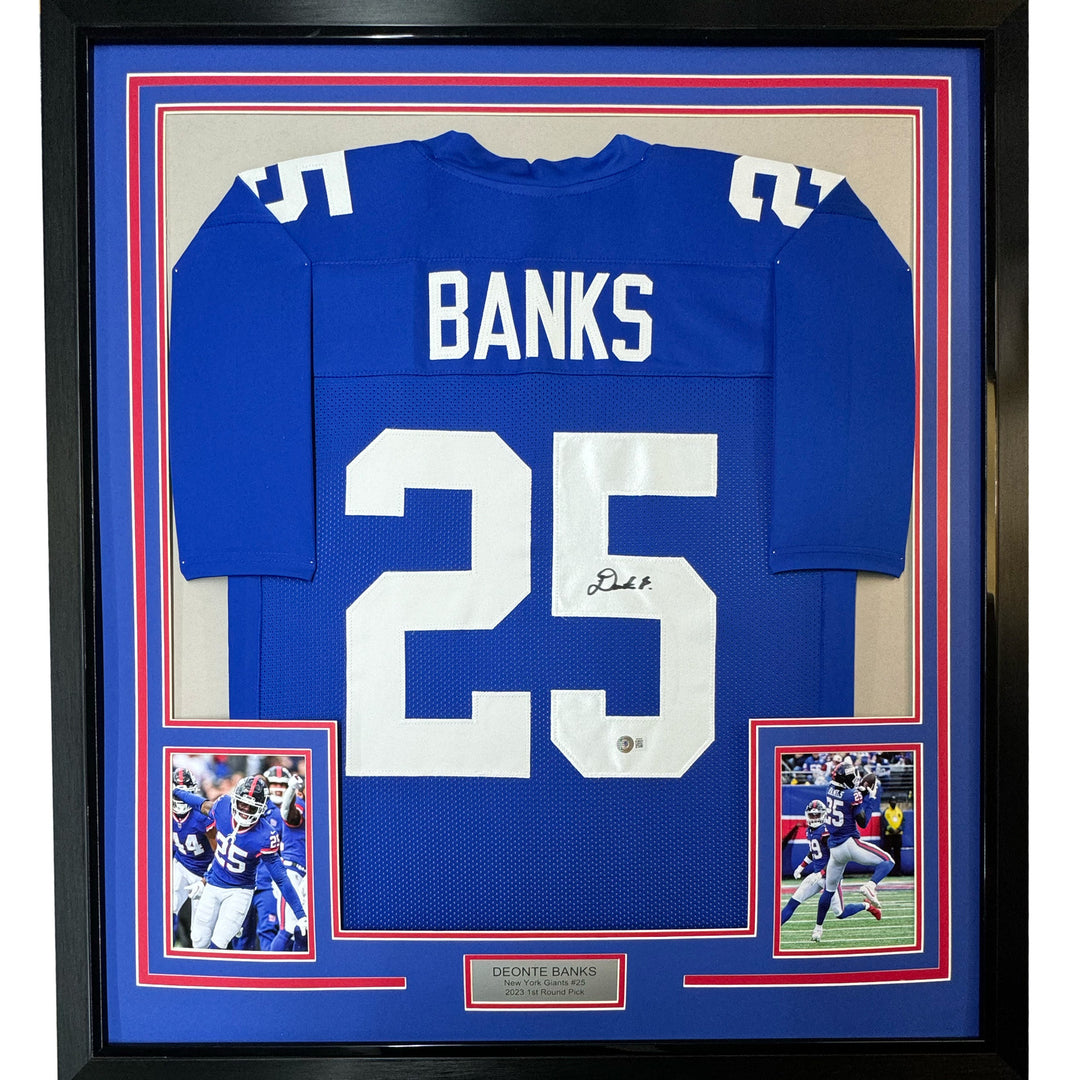 Framed Autographed/Signed Deonte Banks 33x42 New York Blue Jersey BAS COA