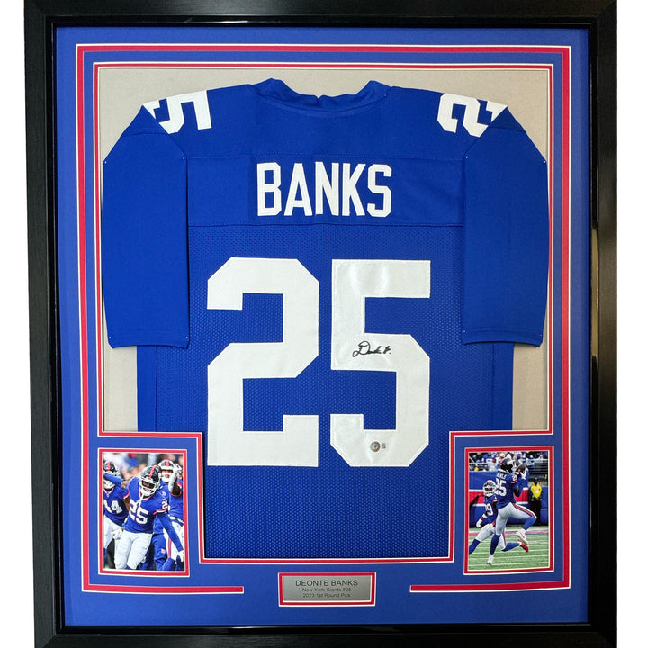 Framed Autographed/Signed Deonte Banks 33x42 New York Blue Jersey BAS COA