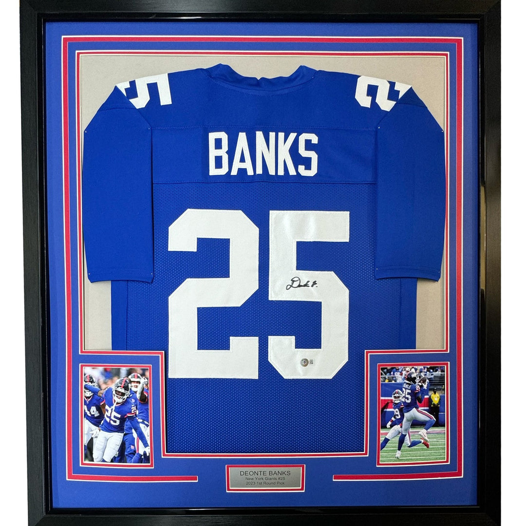 Framed Autographed/Signed Deonte Banks 33x42 New York Blue Jersey BAS COA