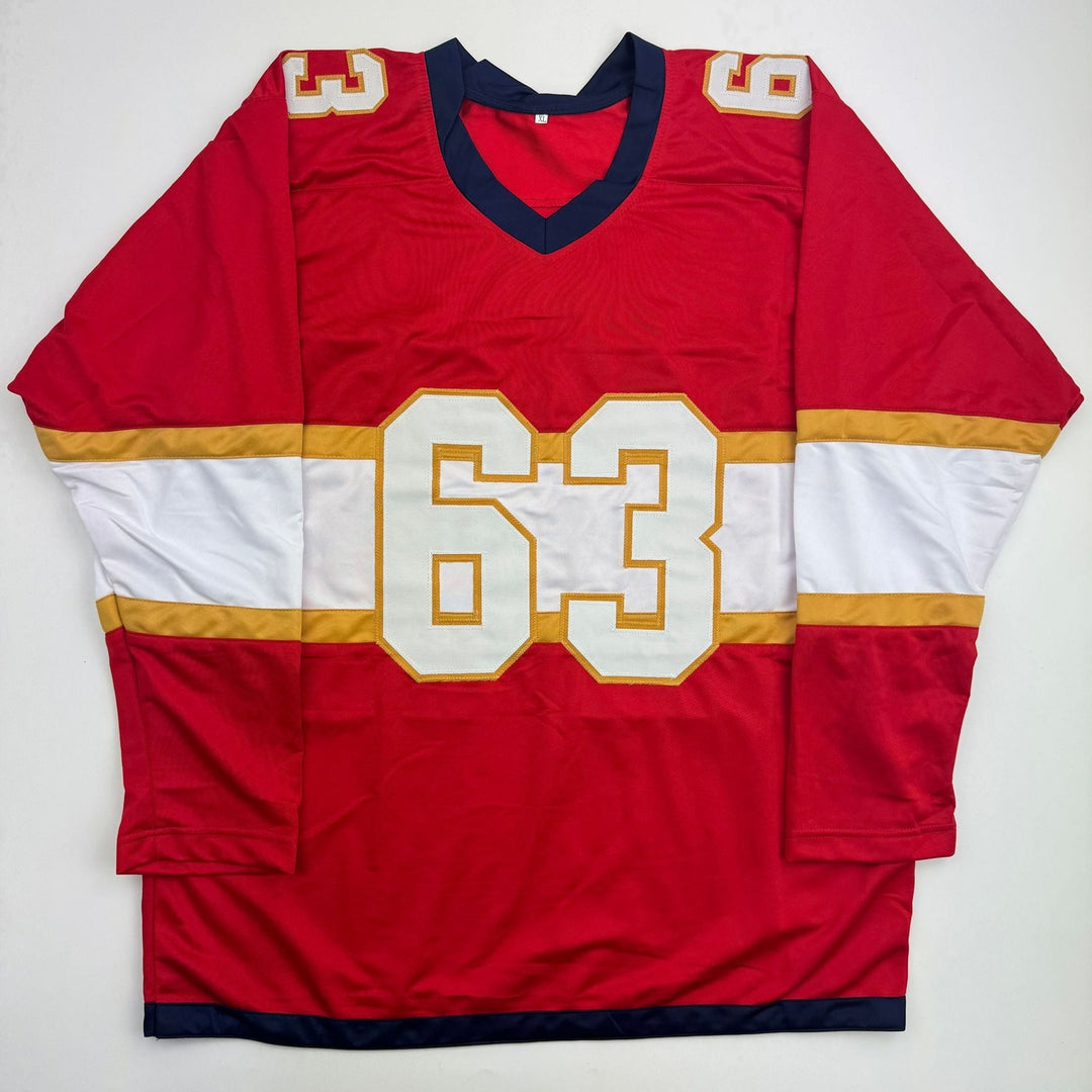 Autographed/Signed Brad Marchand Florida Red Hockey Jersey JSA COA