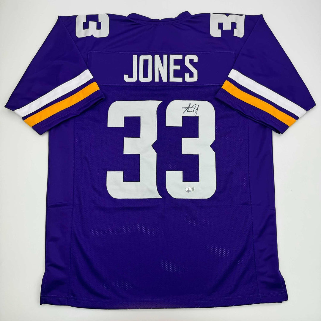 Autographed/Signed Aaron Jones Minnesota Purple Jersey Beckett BAS COA