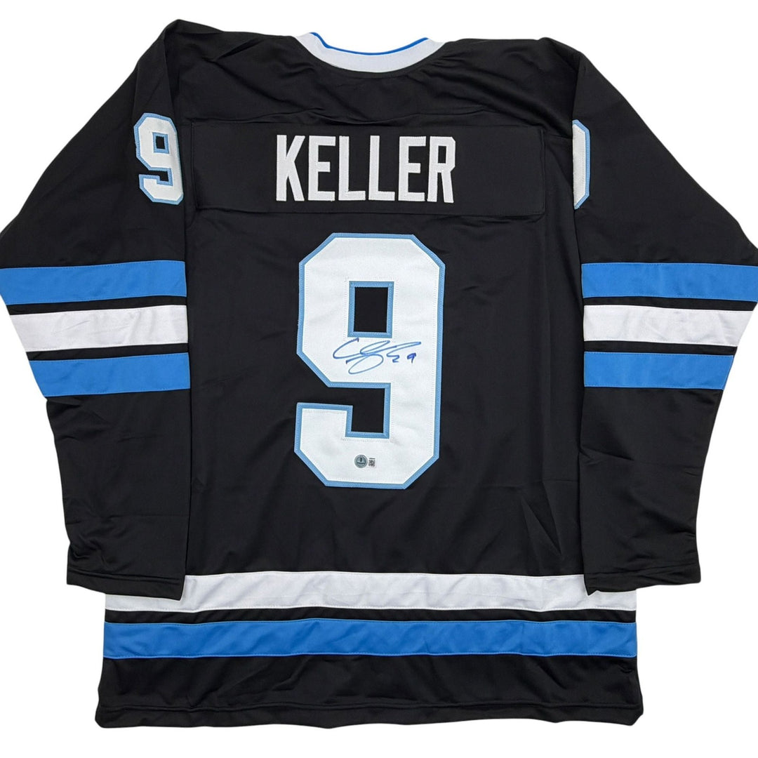 Autographed/Signed Clayton Keller Utah Black Hockey Jersey Beckett BAS COA